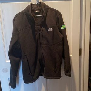 The North Face sweater jacket with DeltaPine emblem on left sleeve.